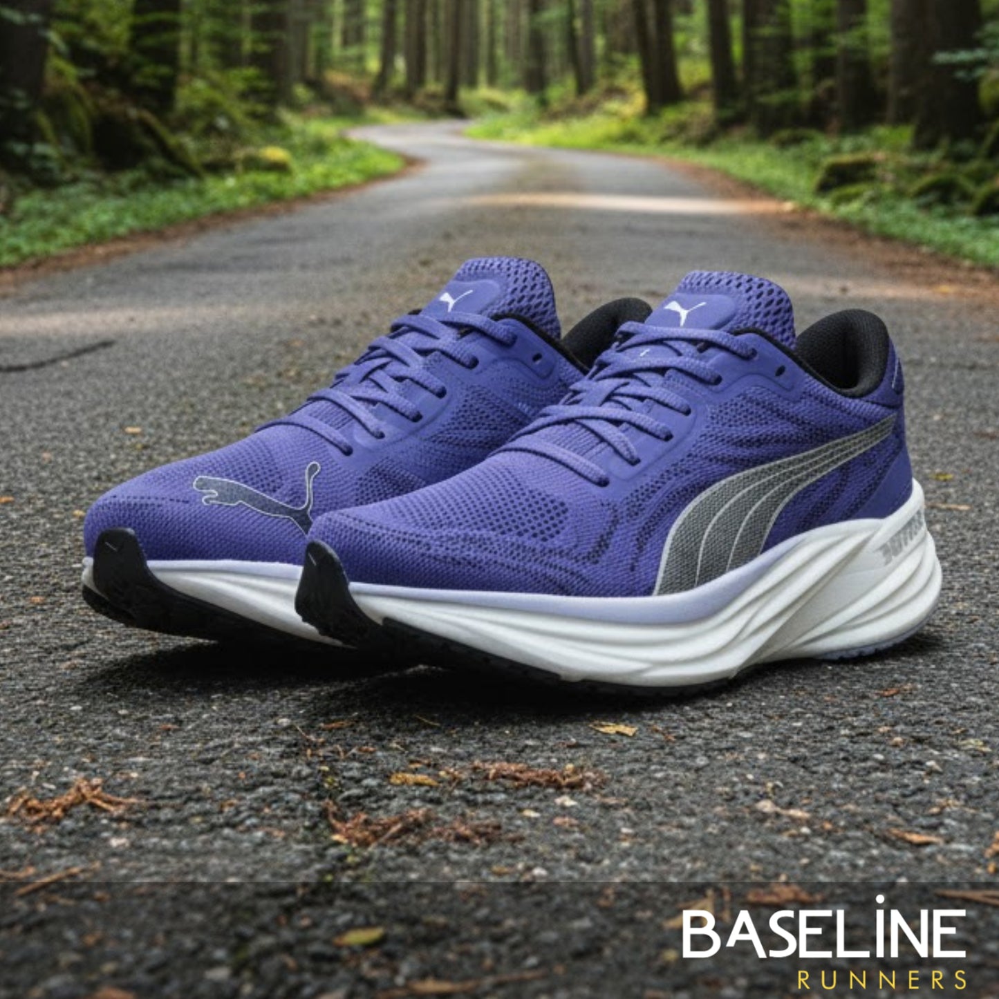 Blue Puma running shoes on a forest path with 'Baseline Runners' branding.