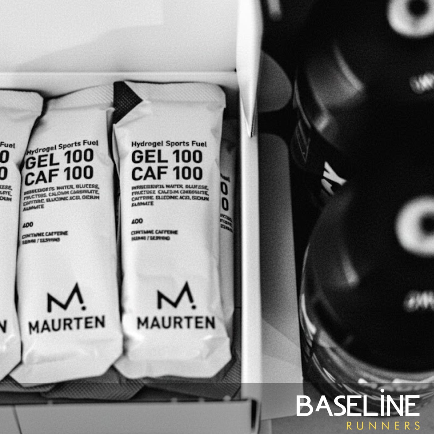 Maurten Gel 100 CAF 100 packets with a close-up of a bottle on a white background.
