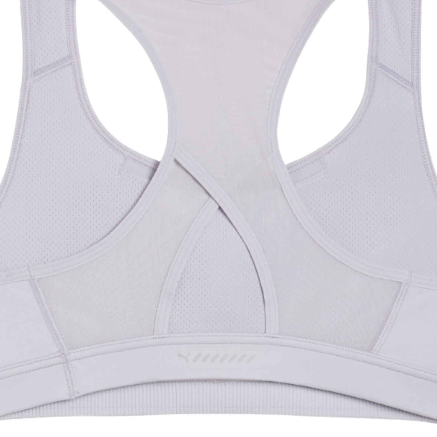 Close-up of a light gray sports bra with mesh panels on a white background