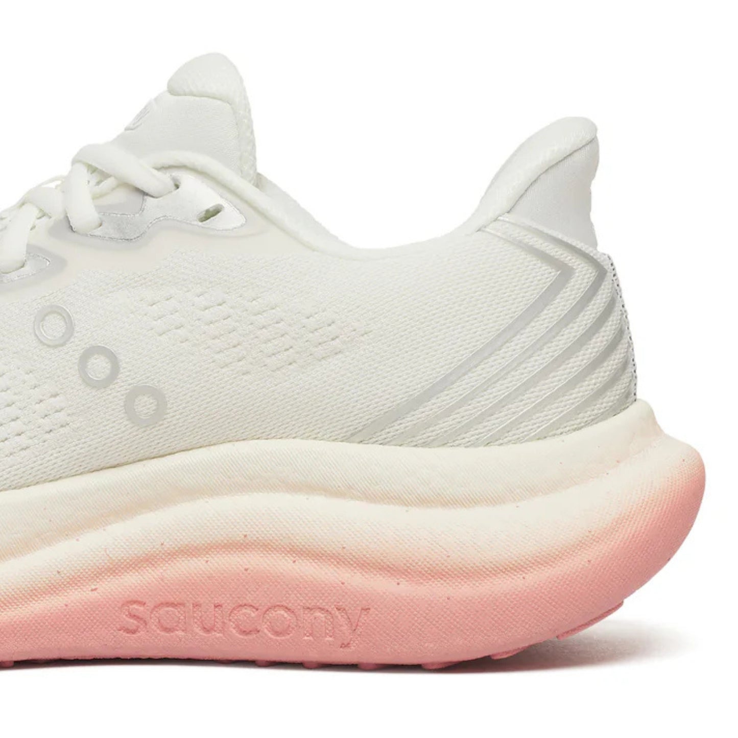 White Saucony running shoe with pink sole on a white background