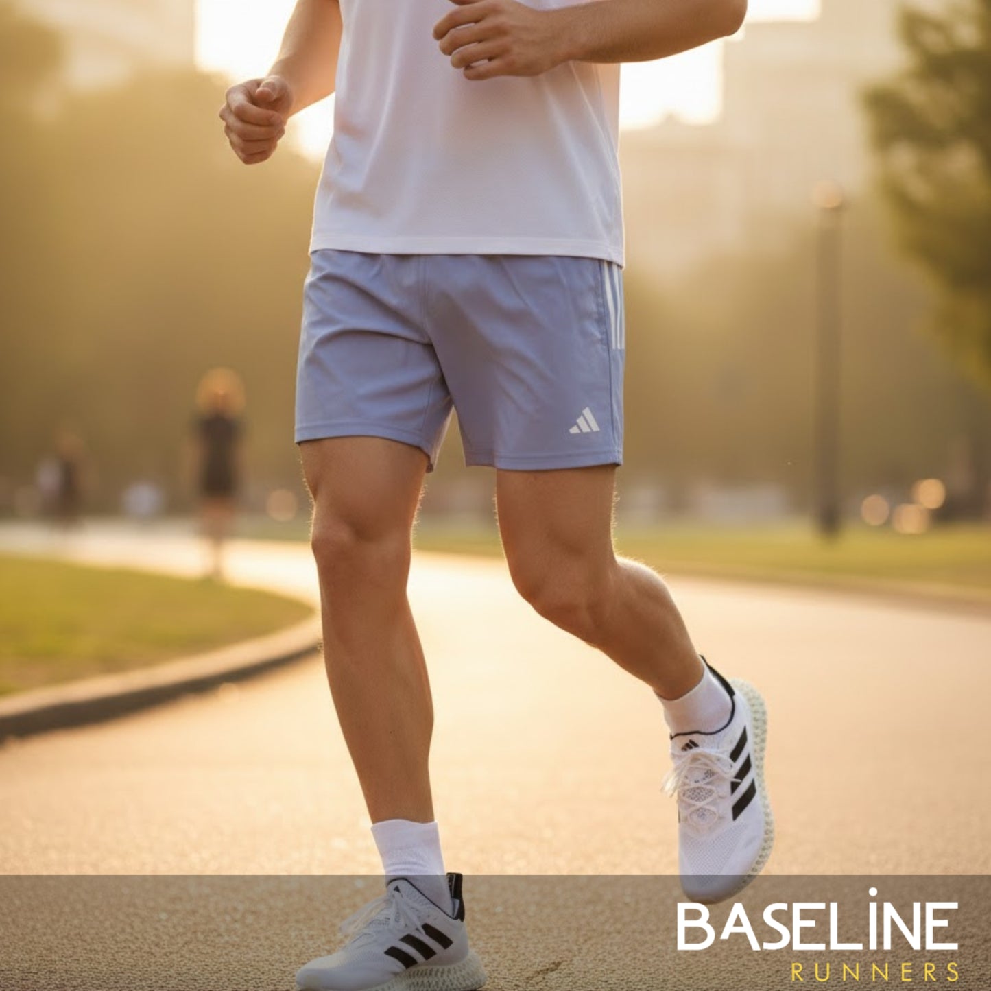 Person running outdoors wearing adidas shorts and shoes with a blurred background