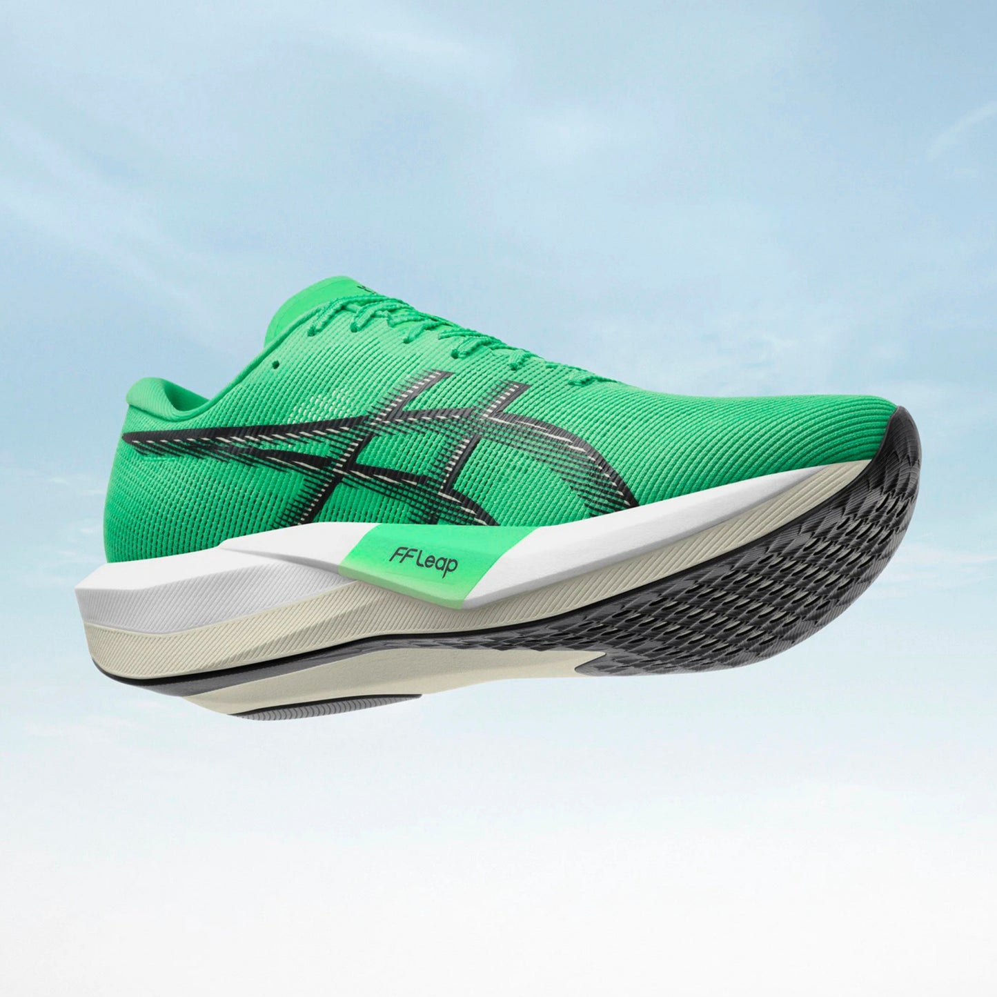 Green Asics running shoe with black and white sole on a light blue background