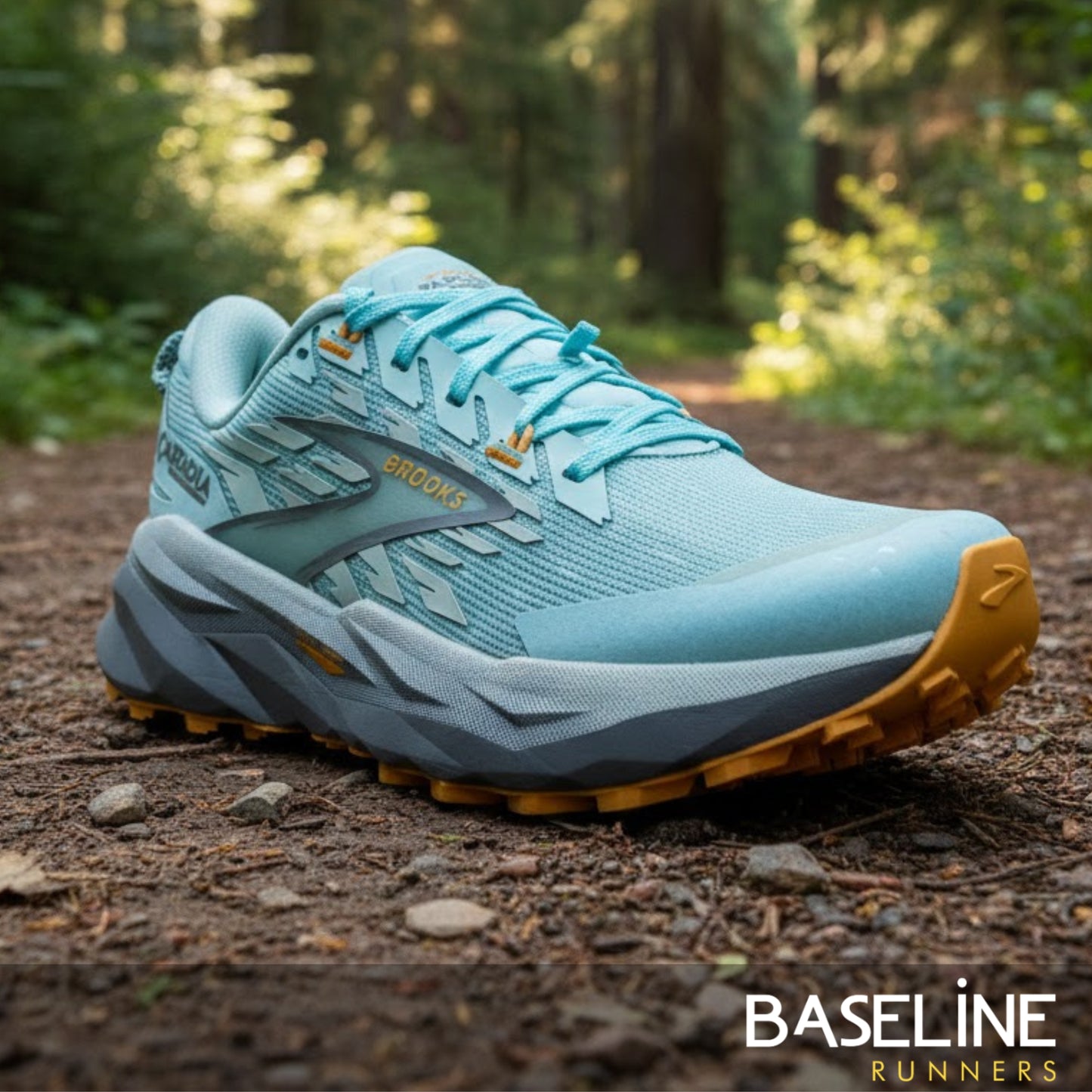 Light blue Brooks running shoe with the wording Cascadia on the side