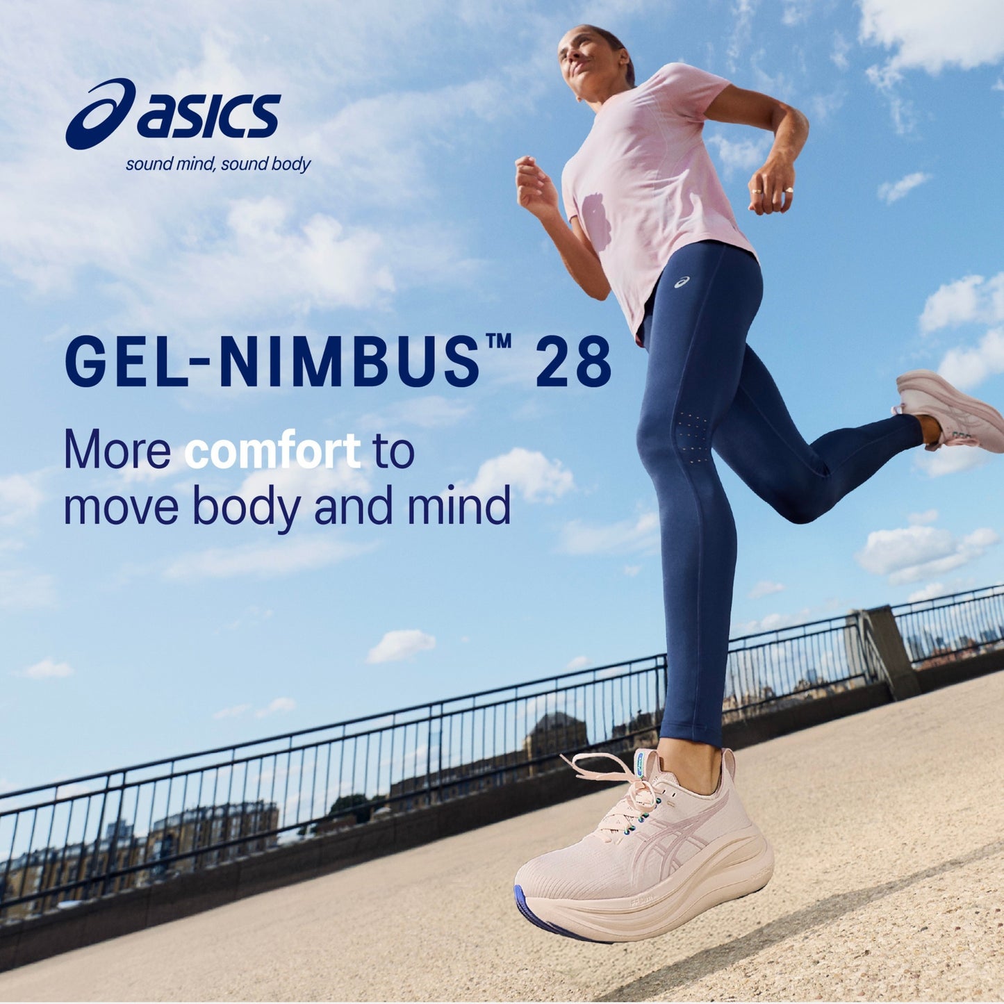 Person running outdoors with ASICS Gel-Nimbus 28 shoes and branding.