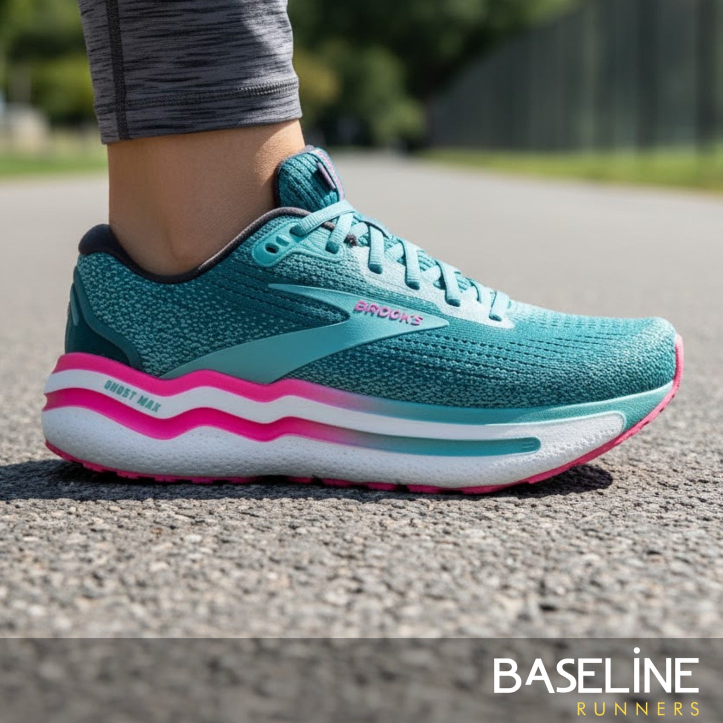 Storm blue and pink running shoe on a road with 'Baseline Runners' branding.
