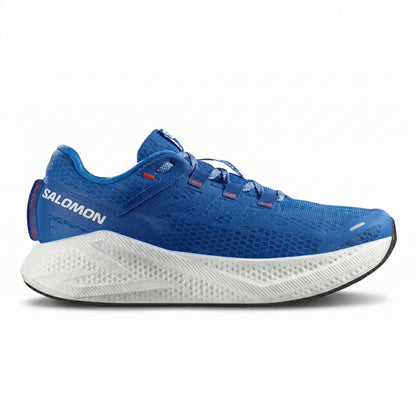 Blue Salomon running shoe with white sole on a white background