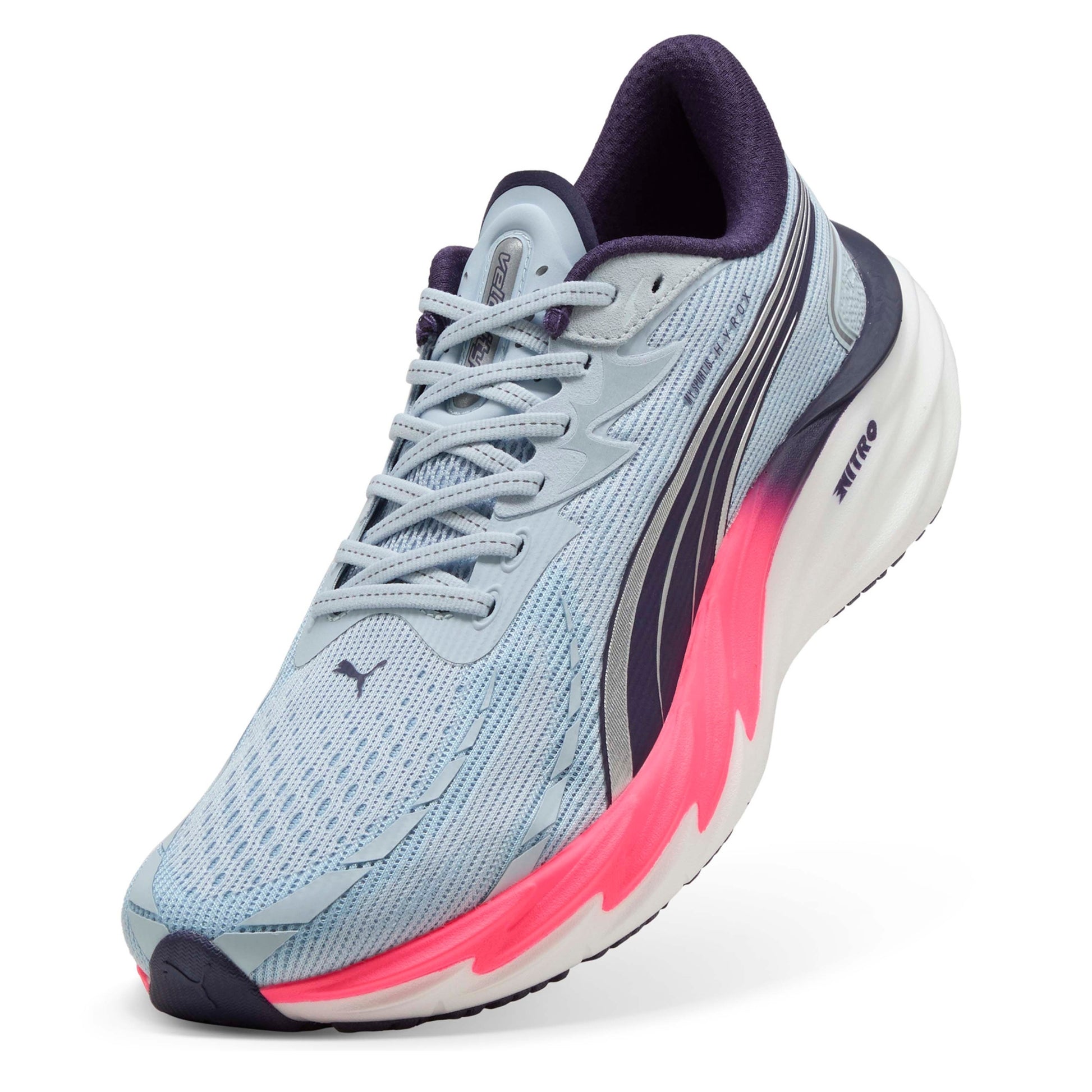 Light blue Puma running shoe with pink sole on a white background