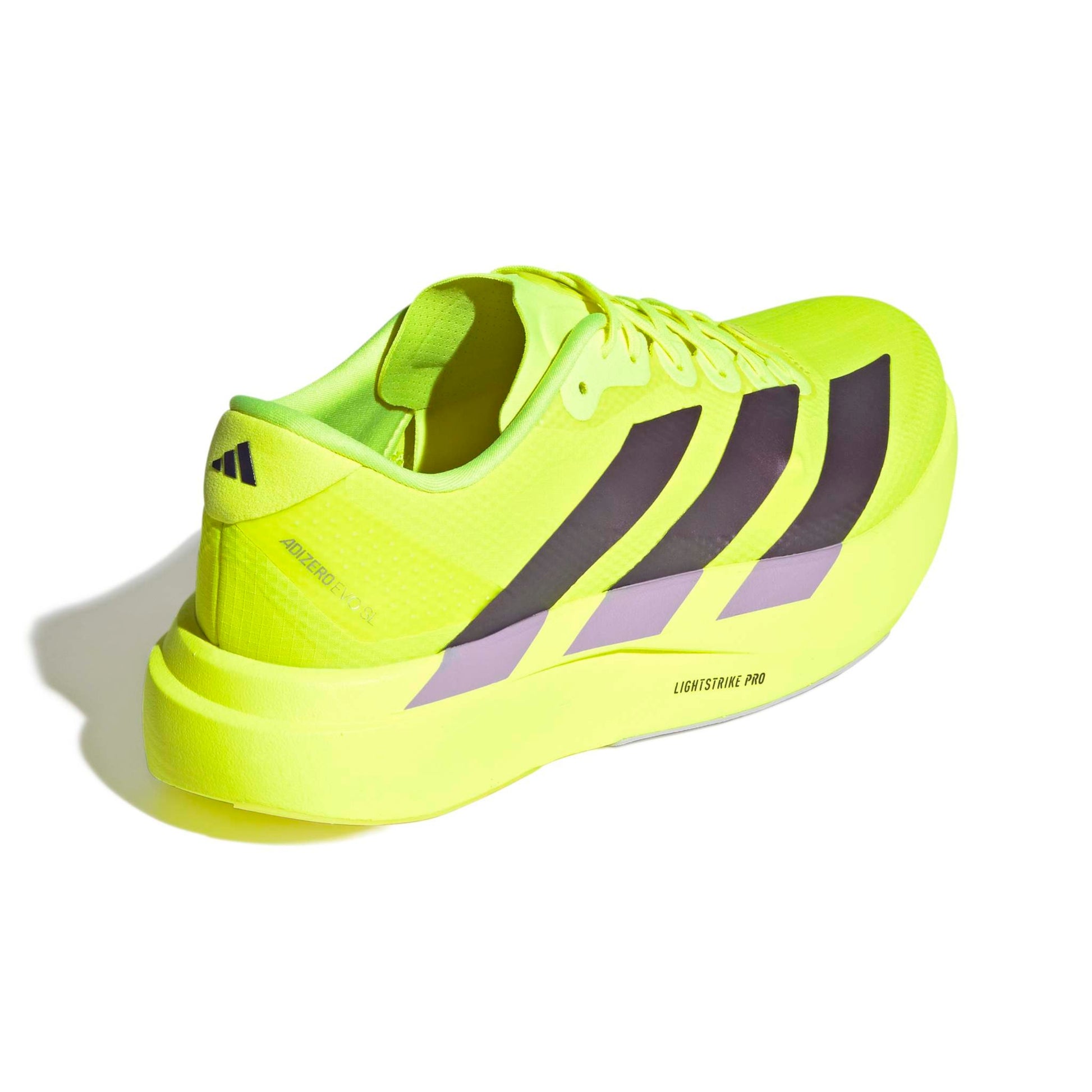 Bright yellow adidas running shoe with black stripes on a white background