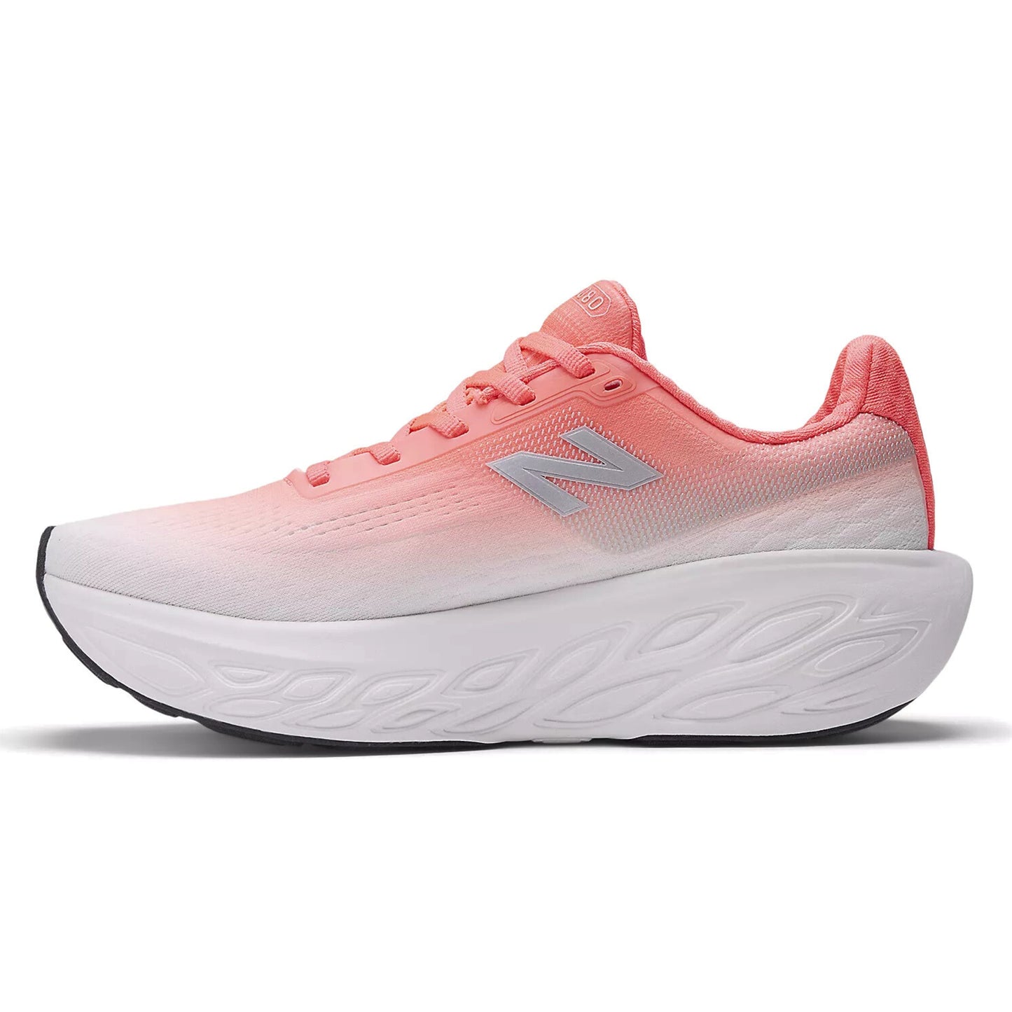 Red and white running shoe with white sole on a white background