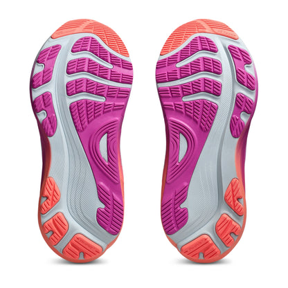 Close-up of pink and orange athletic shoe soles on a white background