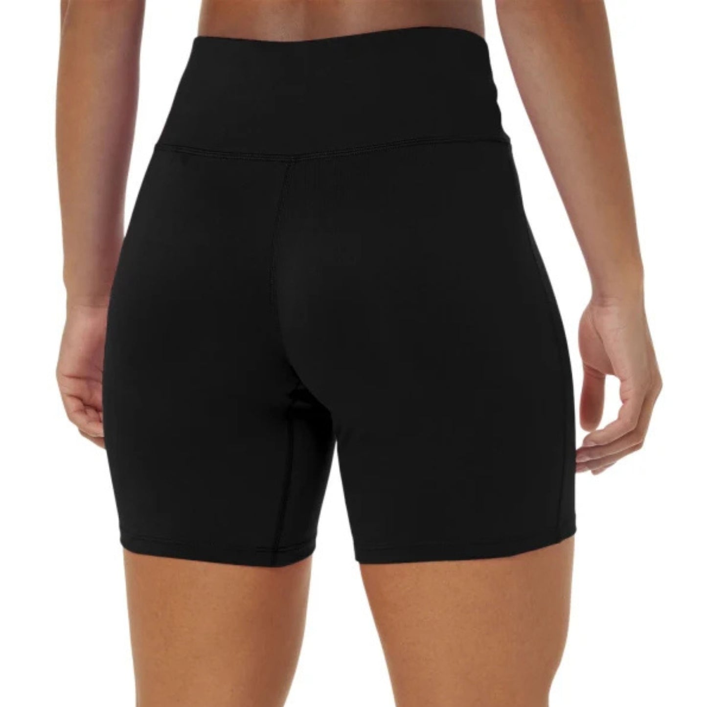 Black tights worn by a person on a white background