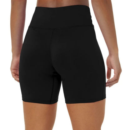 Black tights worn by a person on a white background
