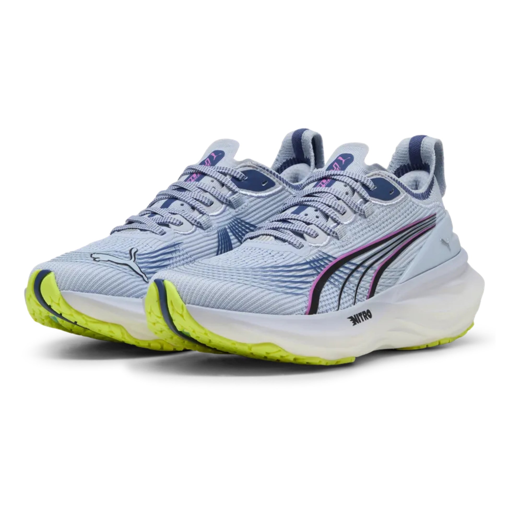 Light blue Puma running shoes with blue and green accents on a white background