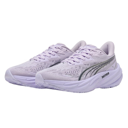 A pair of Puma running shoes in a light lavender purple colorway, featuring a textured mesh upper, matching purple laces, a thick cushioned sole, and a dark gray Puma Formstrip and 'NITRO' text on the side.