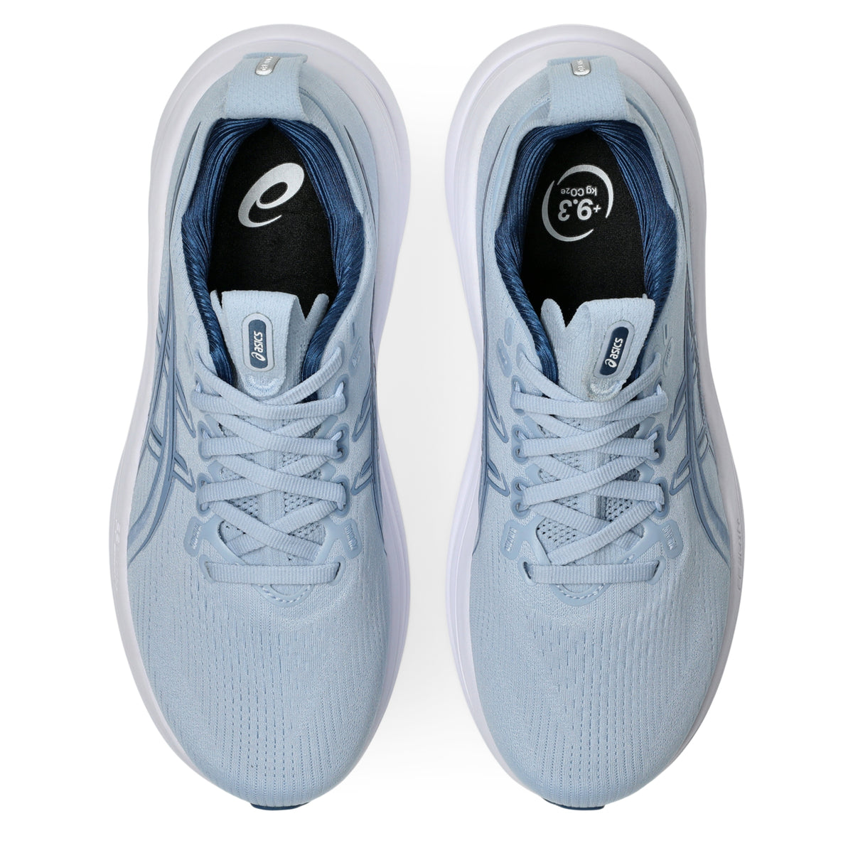 Light blue Asics running shoes with white soles on a white background
