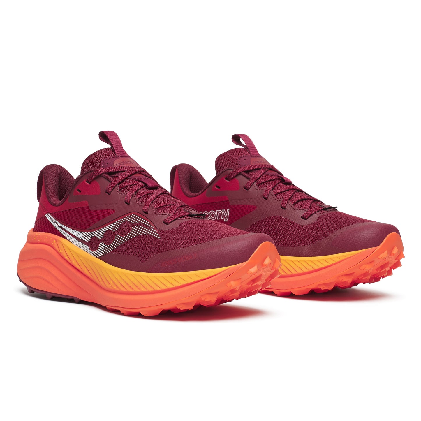 Maroon running shoes with orange soles on a white background