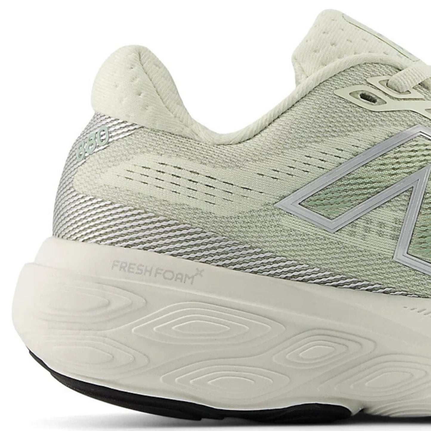 Light green running shoe with 'Fresh Foam' sole on a white background