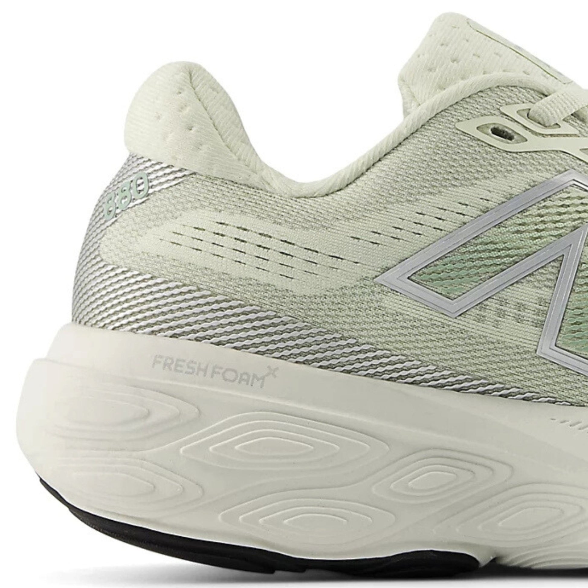 Light green running shoe with 'Fresh Foam' sole on a white background