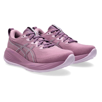 Pair of pink Asics running shoes on a white background