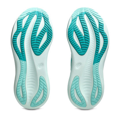 Close-up of a pair of shoes with a distinctive sole design on a white background