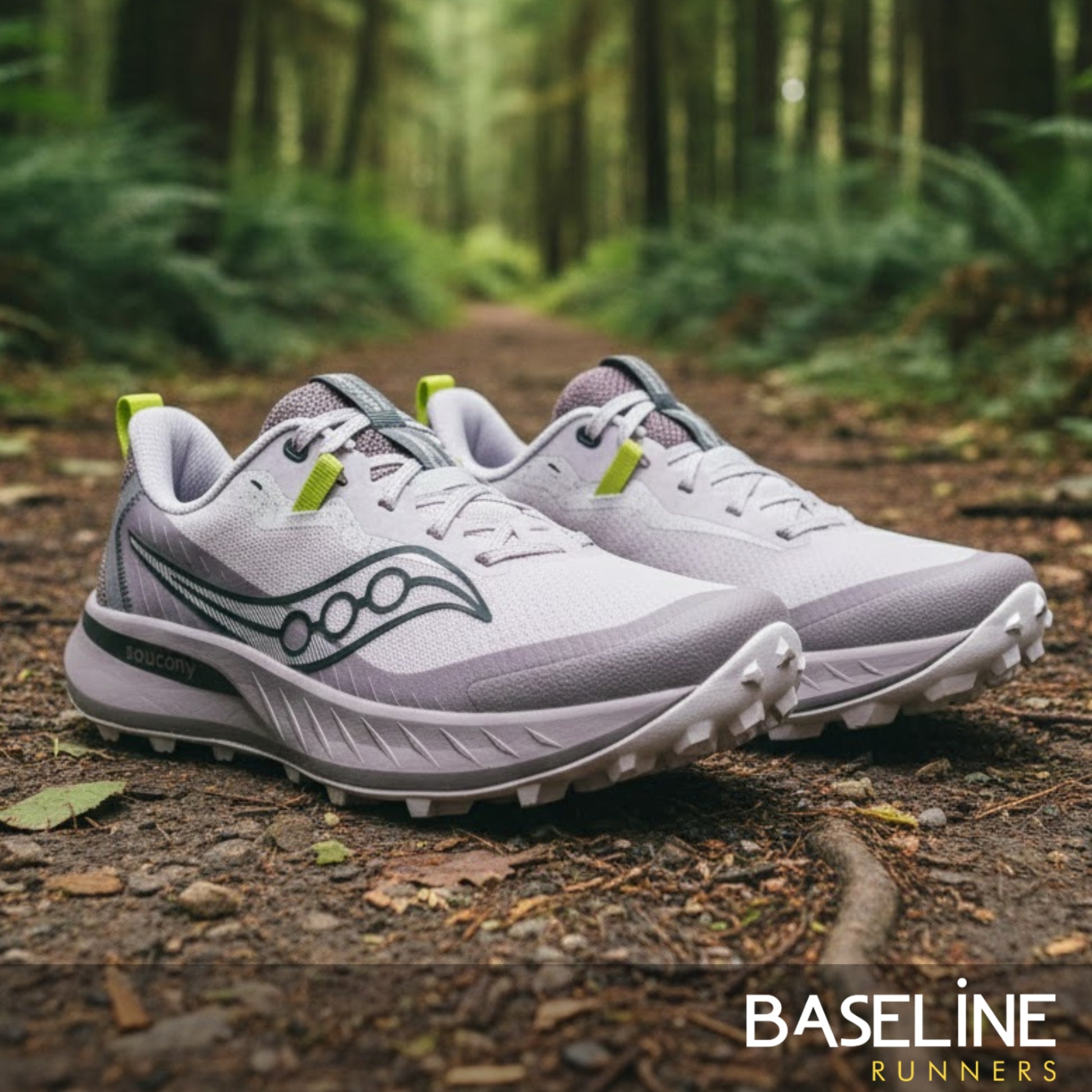 Purple and light purple running shoes with green accents on a forest floor, featuring the Baseline Runners brand