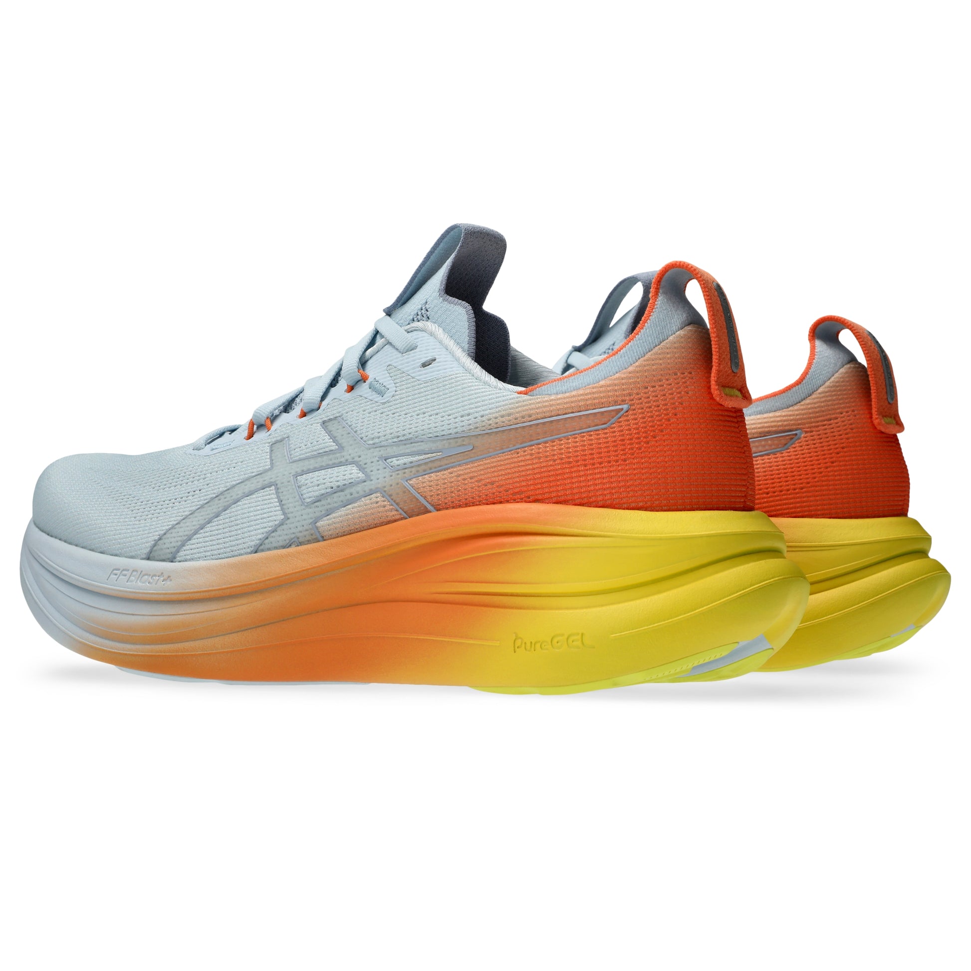 Pair of white and orange Asics shoes with yellow accents on a white background