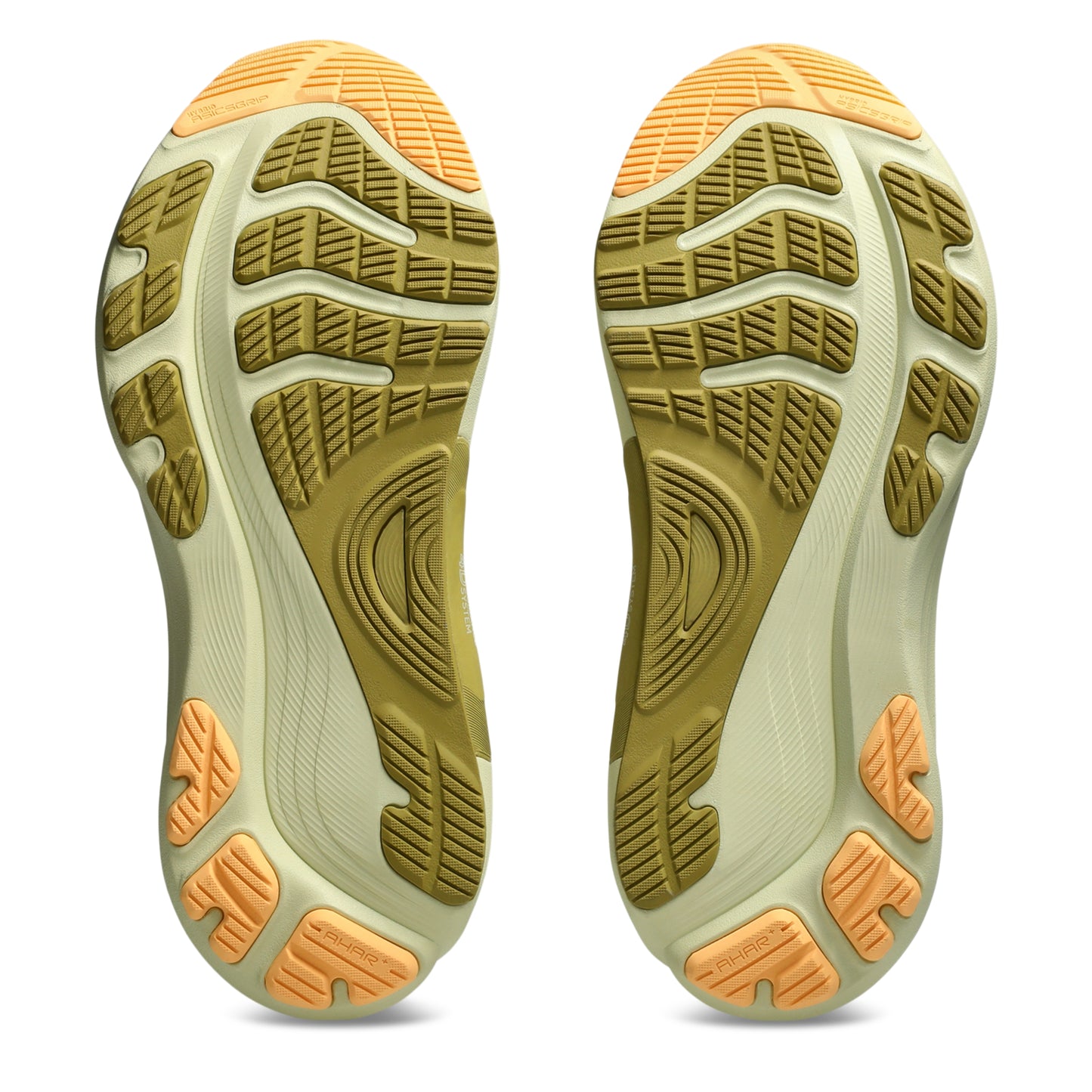 Close-up of a pair of shoes with a focus on the sole design on a white background