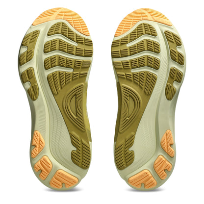 Close-up of a pair of shoes with a focus on the sole design on a white background