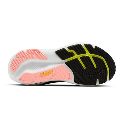 The outsole of a Brooks Running shoe, showing a white base with a black tread pattern accented by lime green and a pink heel section with yellow 'BROOKS RUNNING' branding.