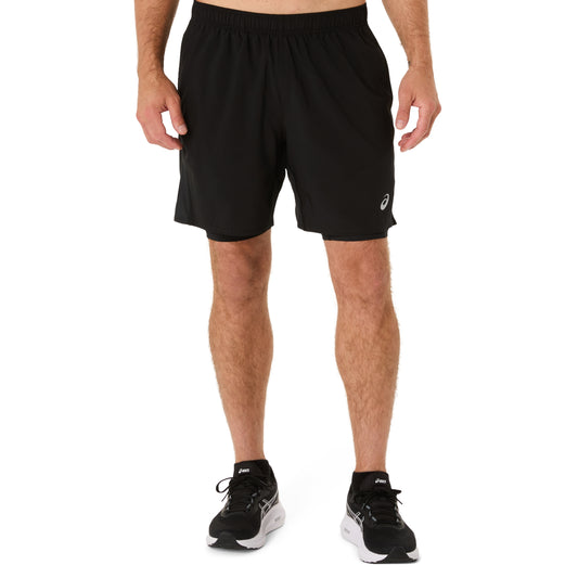 Person wearing black running shorts on a white background