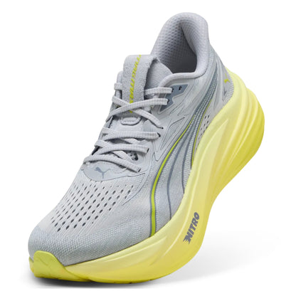 Gray Puma running shoe with yellow sole on a white background
