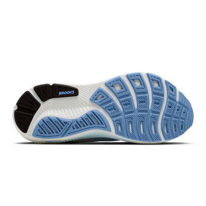 The outsole of a Brooks running shoe, showing a white and light blue tread pattern with a black heel section and the Brooks logo.