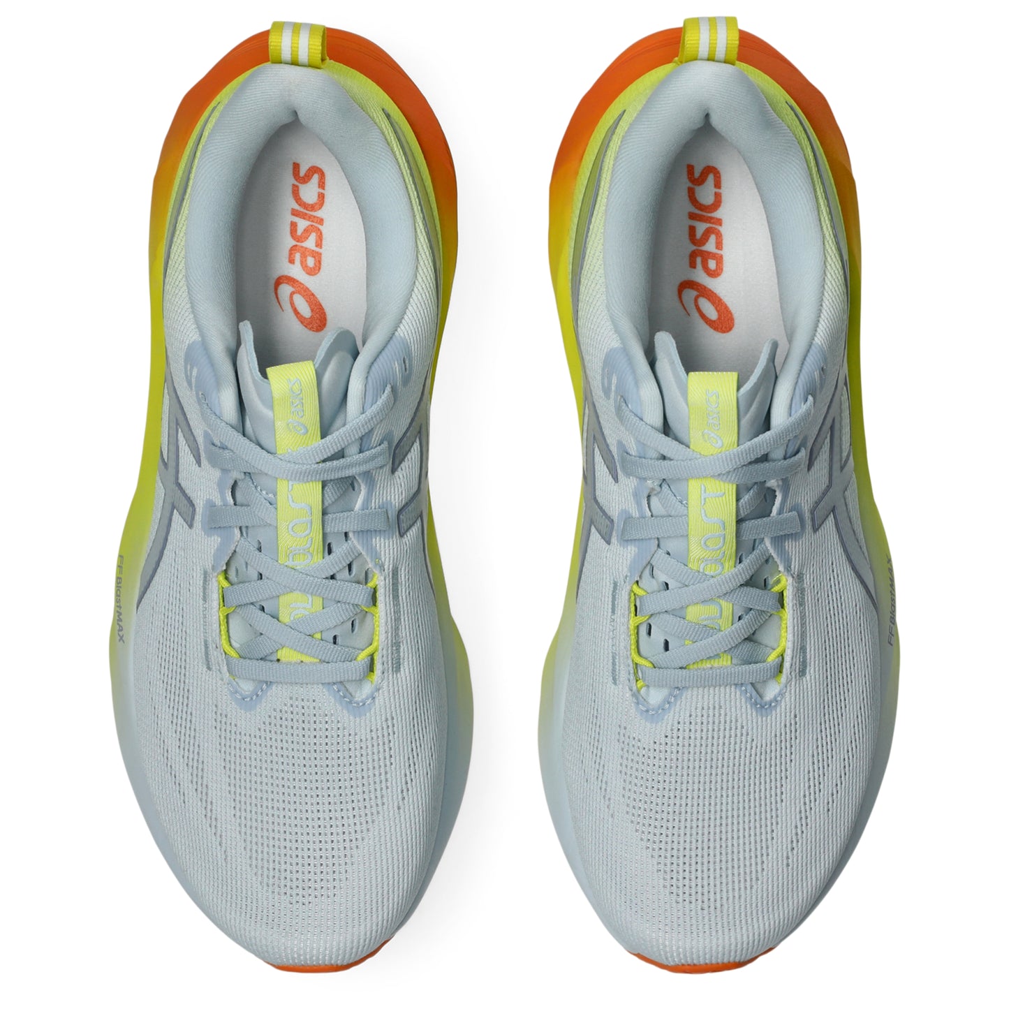 Pair of white and yellow Asics running shoes with orange accents on a white background