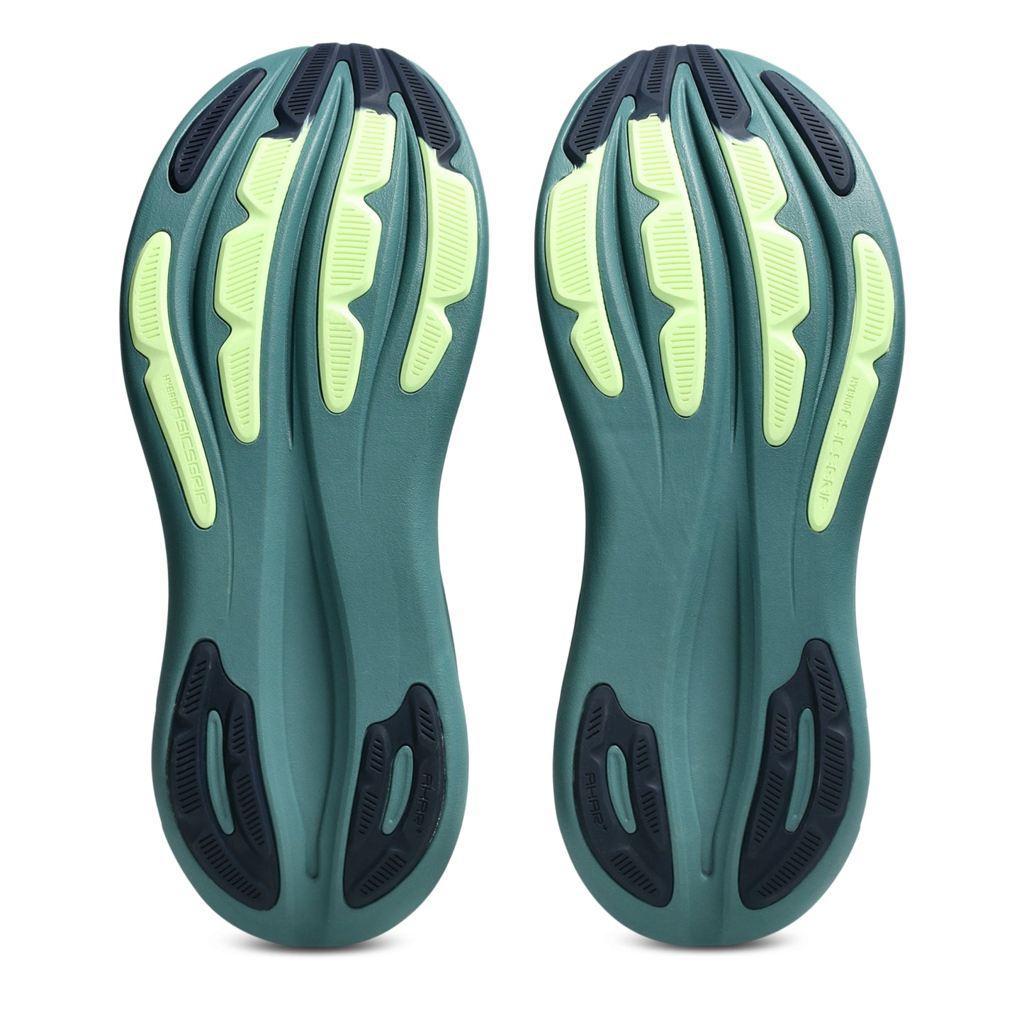 Bottom view of dark green asics running shoe soles on a white background
