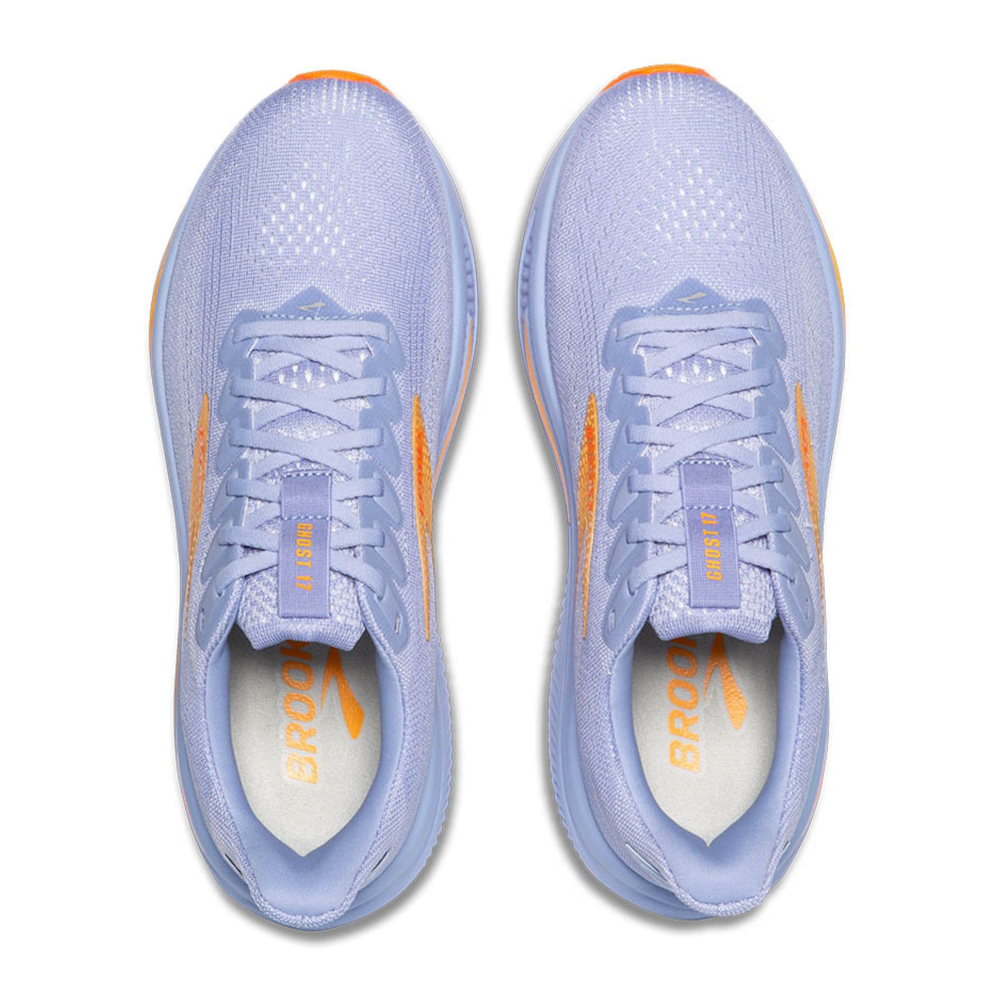 Pair of light blue running shoes with orange accents on a white background