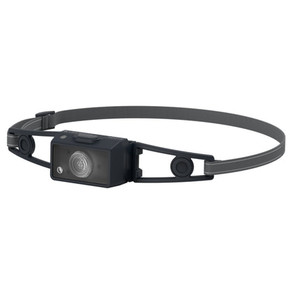 Black headlamp with adjustable strap on a white background