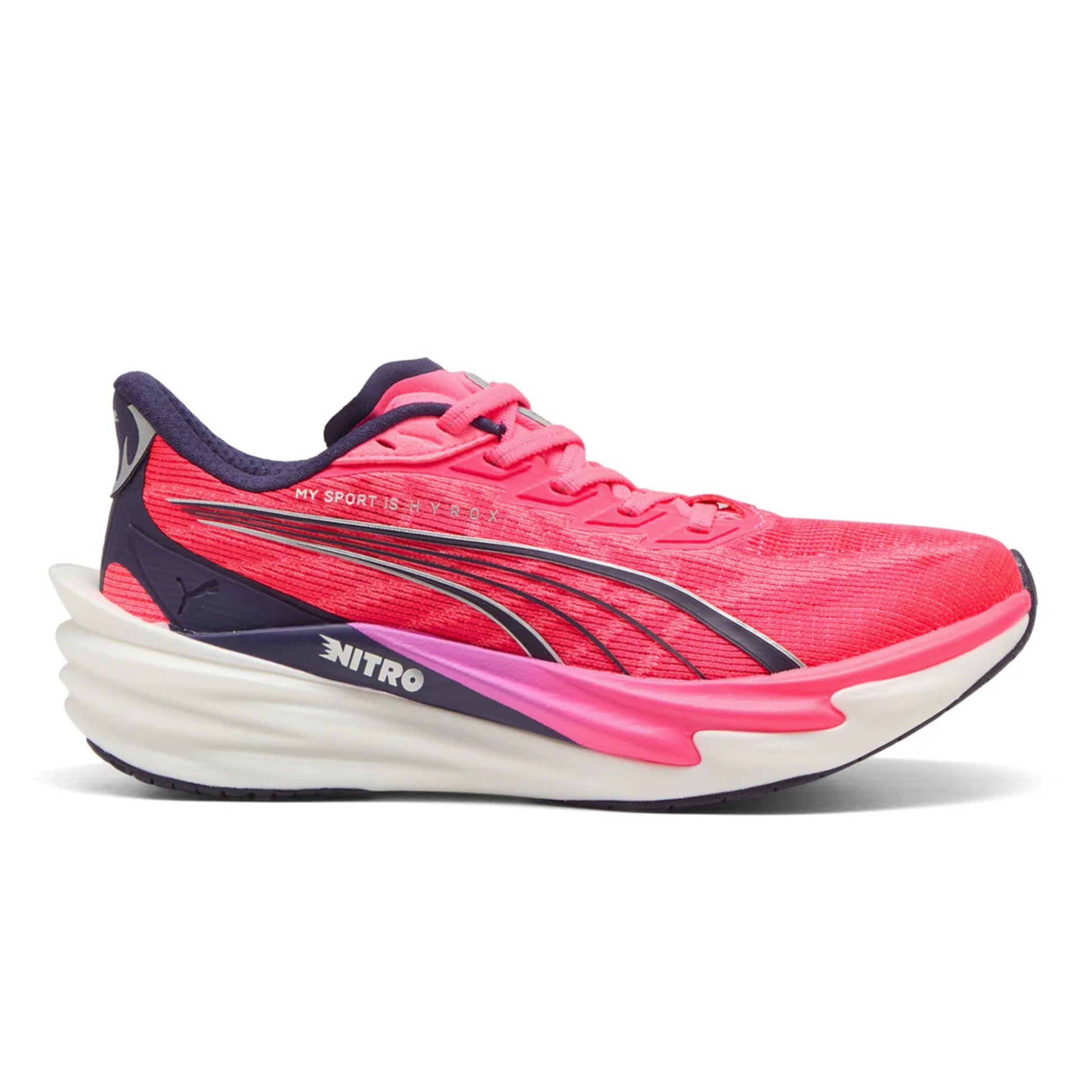 Pink and blue Puma running shoe with white sole on a white background