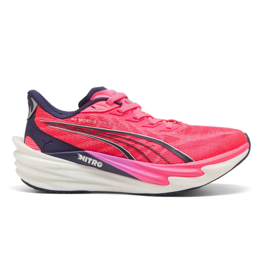 Pink and blue Puma running shoe with white sole on a white background