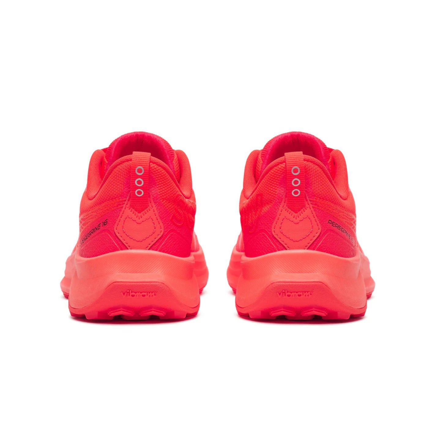 Pair of red Saucony running shoes on a white background
