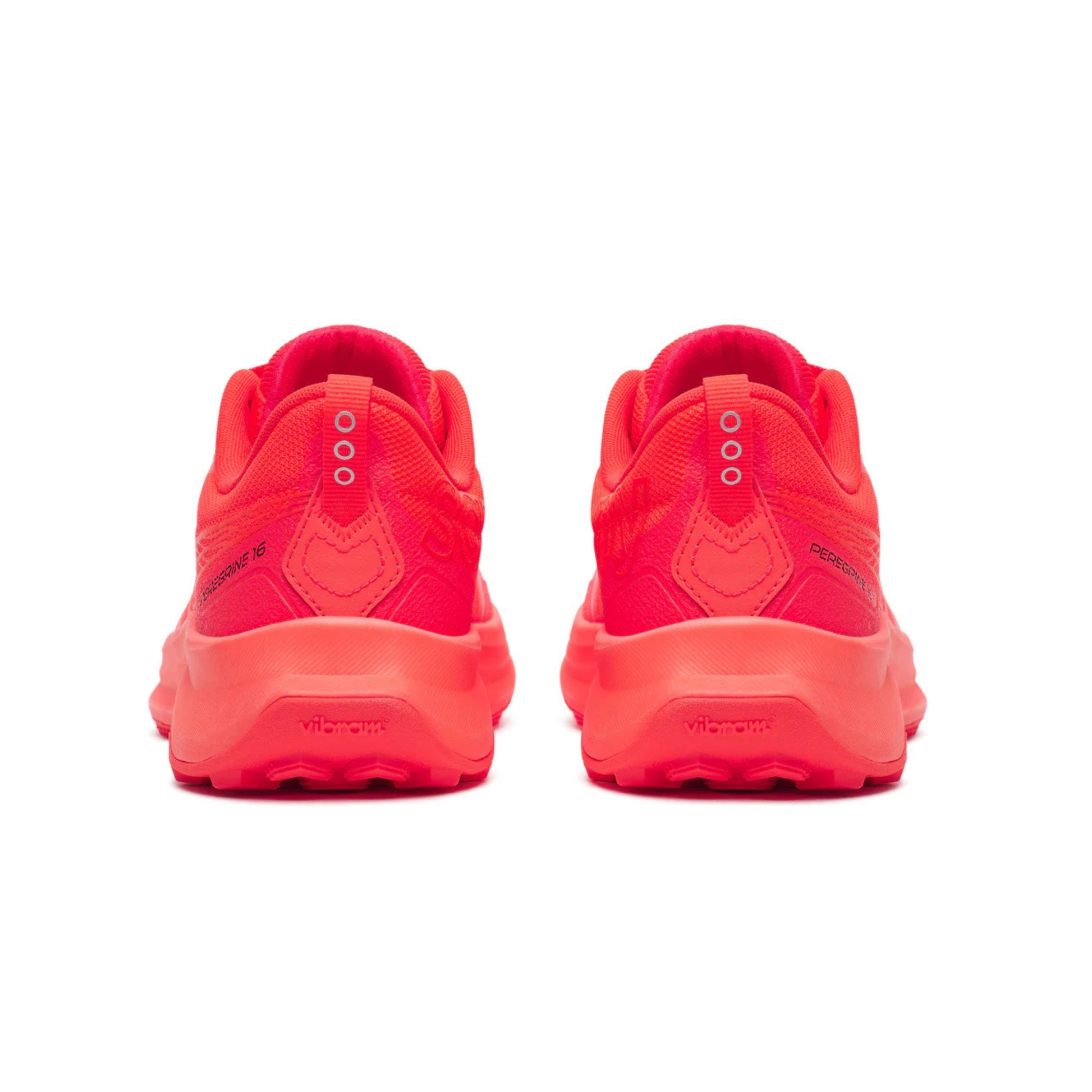 Pair of red Saucony running shoes on a white background