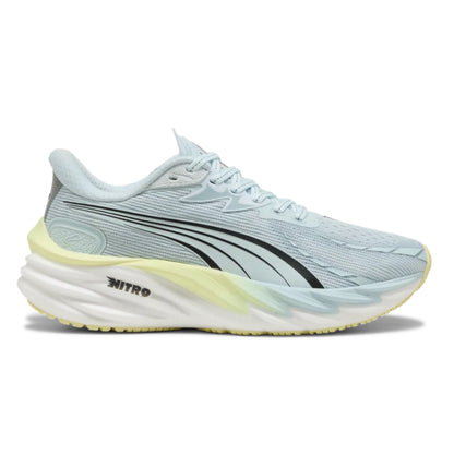 Light blue running shoe with yellow sole on a white background
