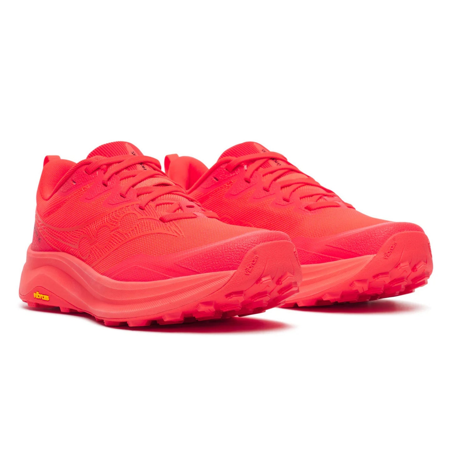 Pair of red Saucony running shoes on a white background