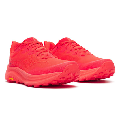 Pair of red Saucony running shoes on a white background