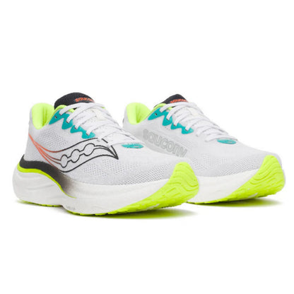 White and black running shoes with yellow accents on a white background