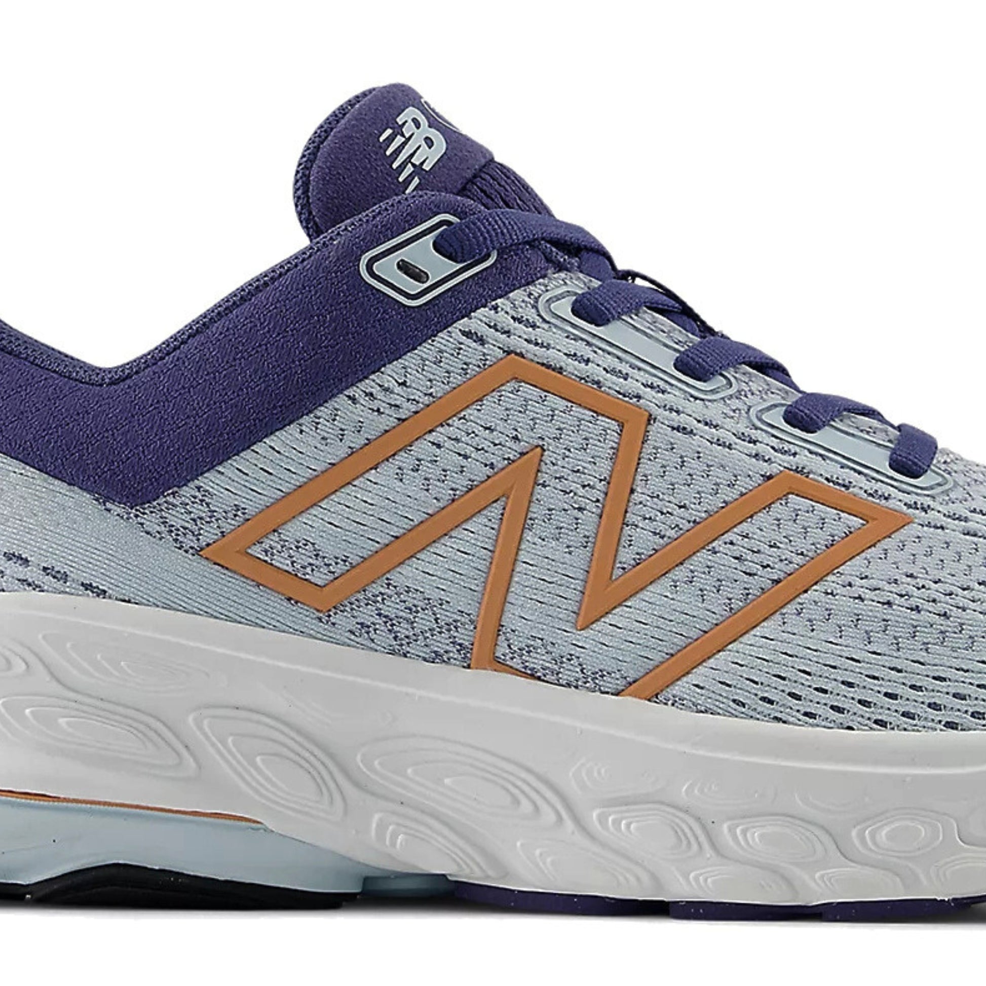 Light blue running shoe with orange logo on a white background