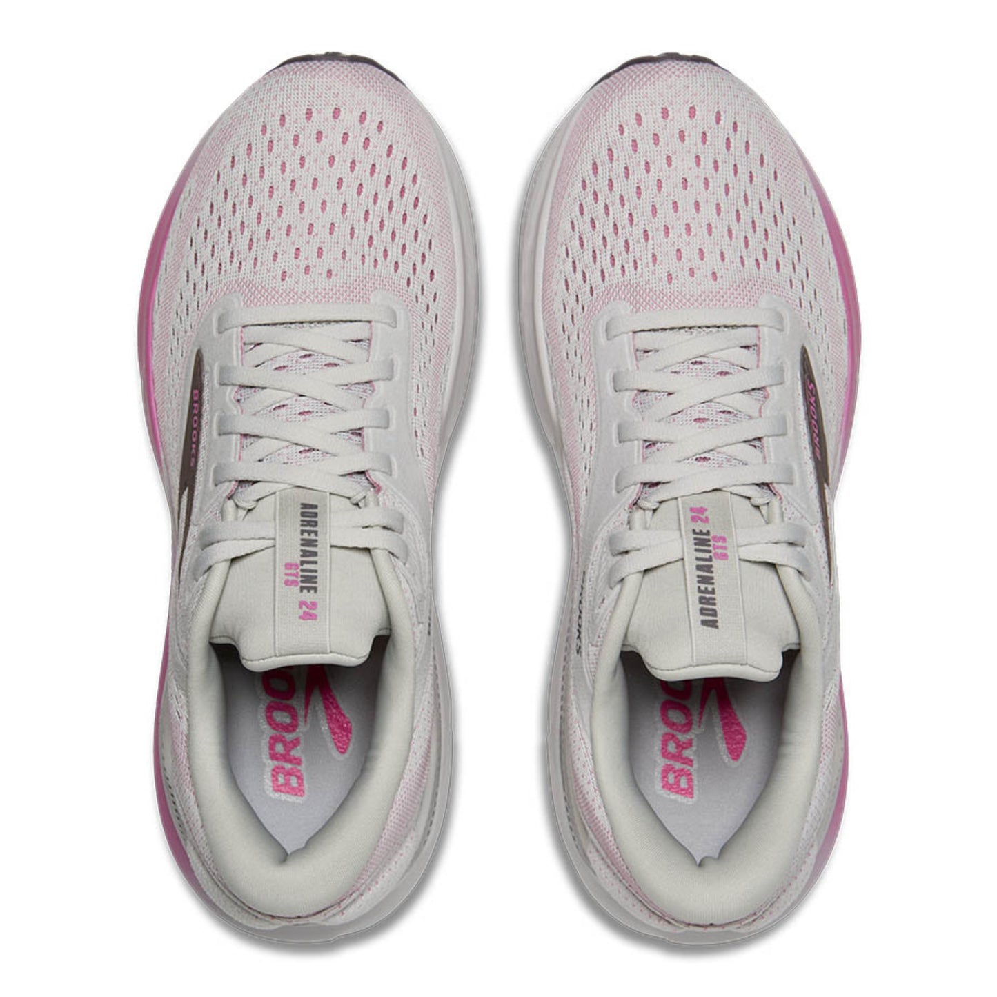 Pair of gray and pink running shoes on a white background