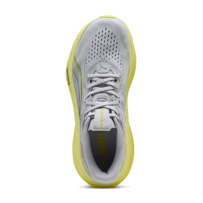 Gray and yellow Puma running shoe on a white background