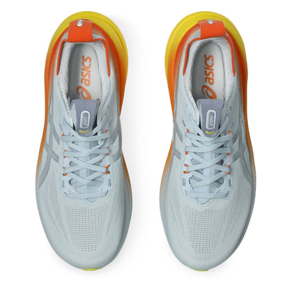 Pair of white and orange Asics shoes with yellow accents on a white background