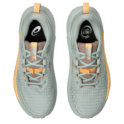 Asics running shoe with green and warm yellow tan accents with black cushioning 