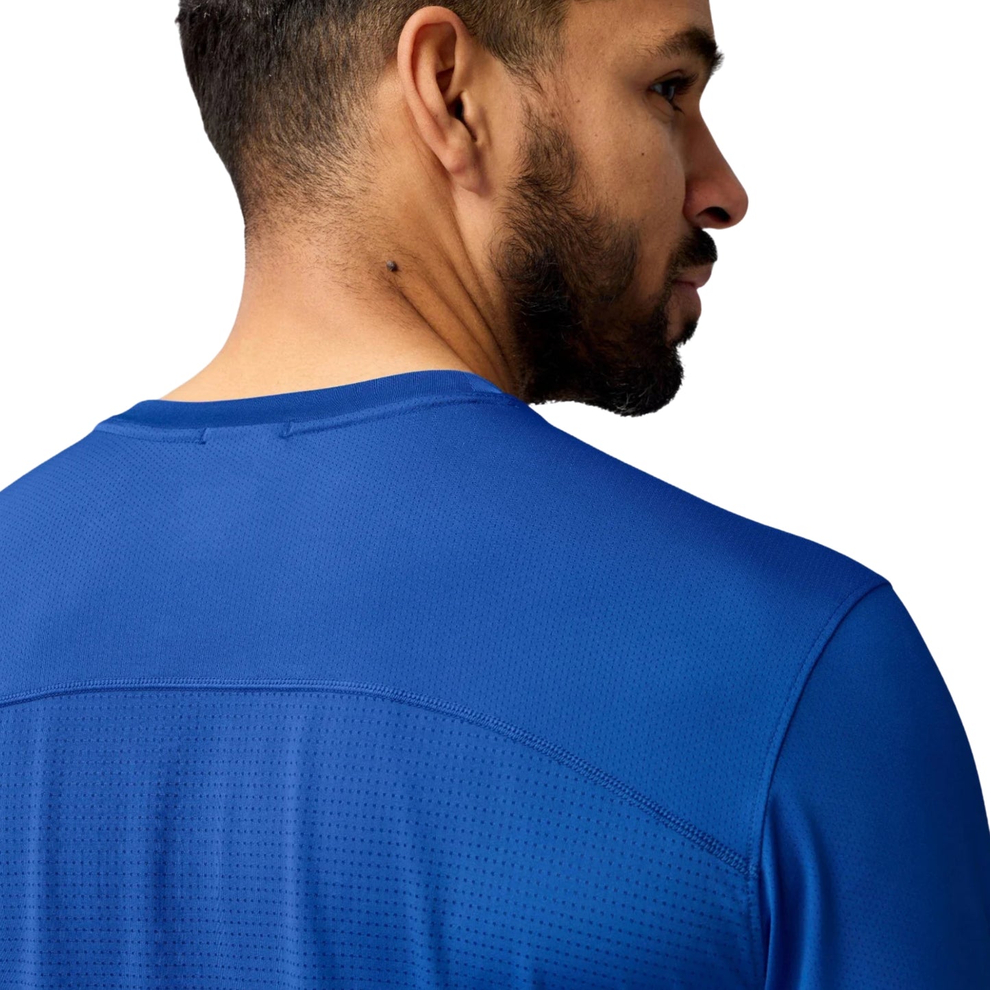 Close-up of a man wearing a blue shirt on a white background